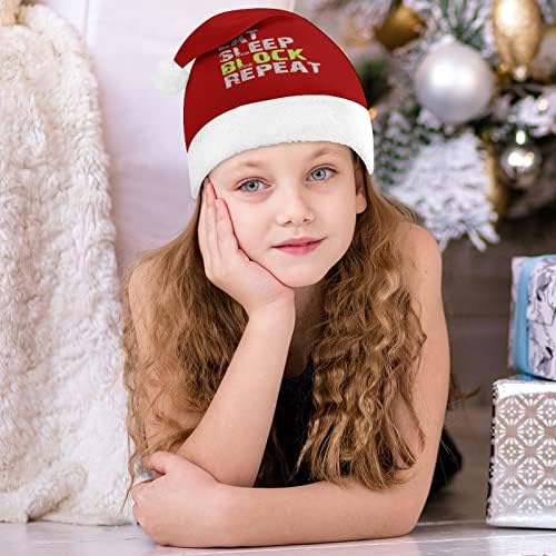 Coma bloco de sono repetindo o chapéu de natal de Natal e bons chapéus de Papai Noel com borda de
